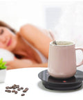 Solid Daily Driver One Button Cup Warmer Heating Plate With Lightning Fast Five Second Heat Up And Zero Leak Constant Temperature For Home Coffee with steaming cup on table