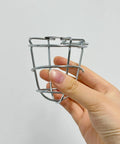Pair Of Badass Fire Sprinkler Head Guards Made From Rust Resistant Stainless Steel Heavy Duty Cage Covers For One Half And Three Quarter Inch Systems being held in hand.