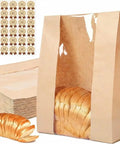 30 Pack Bread Bags With Window Including 30 Homemade Bread Storage Label Stickers Clear Window Bakery Bags For Fresh Baked Goods Large 13.7x8.3x3.5 Inches Great For Gifting And Storing showing sliced bread, kraft paper material, and label stickers.