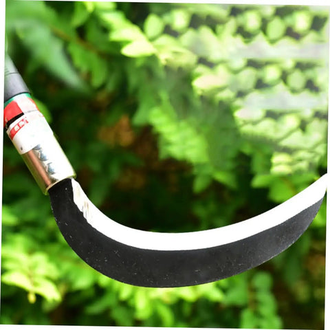 Close-up of Two Piece Manganese Steel Weeding Sickle Ergonomic Short Handle Garden Tool Set blade in greenery