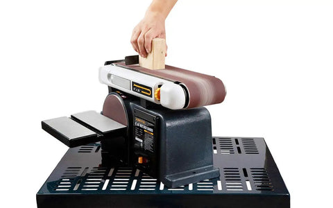 Rugged Belt And Disc Sander Combo For Woodworking With 4 By 36 Inch Belt And 6 Inch Disc Tilt Tables in use, shaping wood block
