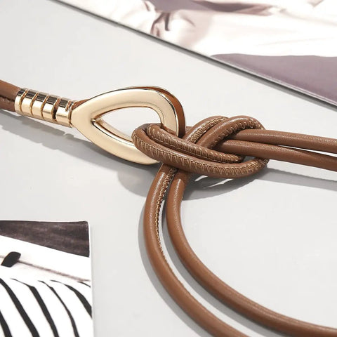 Women Knotted Skinny PU Leather Waist Belt With Gold Alloy Buckle Adjustable Double Rope Design showing knot and gold clasp detail.