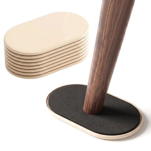 Eight Pack Heavy Duty Furniture Sliders For Carpet And Hardwood Flooring Featuring A Thick Cushioned Buffer for table legs.