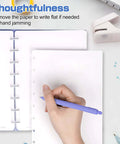 Hand using Mini Mushroom Hole Punch 1 Hole Puncher on paper, showing ease of use for booklets and crafts in school and office projects