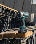 Beefy 18V Brushless Cordless Impact Wrench Half-Inch Square-Drive on construction beam, showcasing heavy-duty use.