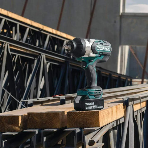 Beefy 18V Brushless Cordless Impact Wrench Half-Inch Square-Drive on construction beam, showcasing heavy-duty use.