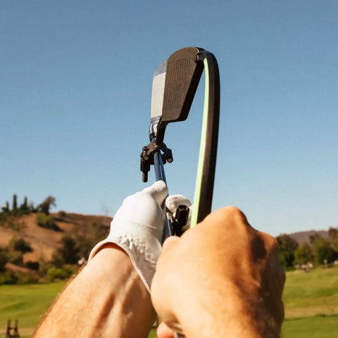 Right Hand Golf Swing Training Aid That Improves Clubface Awareness, Swing Plane, And Impact in action on a golf course