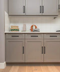Five Pack 5 Inch Square Cabinet Handles Matte Black Drawer Pulls For Kitchen Cupboard Hardware installed on gray cabinets