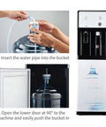 Game Changing Bottom Load Water Cooler With Triple Temp Settings Floor Standing Drink Dispenser For Tea Coffee And Office Use Zero Hassle Refills And Quiet Operation showing water pipe insertion process.