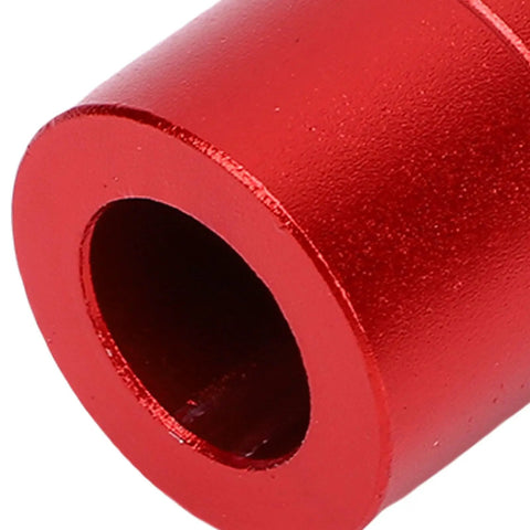 Close-up of a red clamp from Aluminum Alloy Bench Dogs Set For Woodworking, 10 Pieces, Non Slip Workbench Stops, 20mm Diameter.