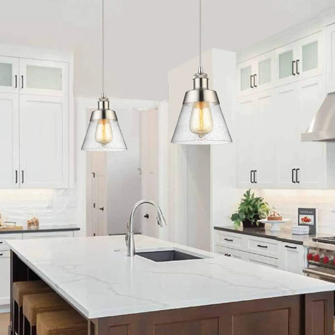 Dope Handblown Seeded Glass Pendant Light With Brushed Nickel Finish over kitchen island in modern kitchen setting