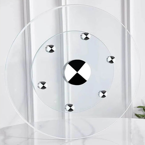 Round Tempered Glass Lazy Susan Turntable With Slick Silent Swivel Base Hella Spacious 90cm Dining Table Centerpiece shown from the front.