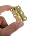 Golden Brass Piano Music Stand Hinges With Thick Bearings Old-School Vintage Style Folding Flips shown in hand