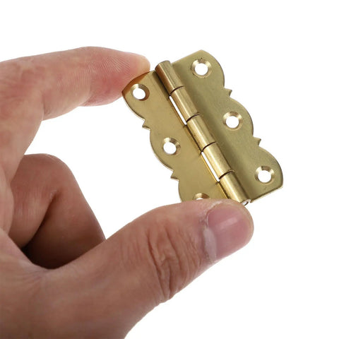 Golden Brass Piano Music Stand Hinges With Thick Bearings Old-School Vintage Style Folding Flips shown in hand