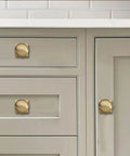 Two Pack One And One Quarter Inch Backplates For Cabinet Knobs With Champagne Bronze Finish on kitchen cabinetry
