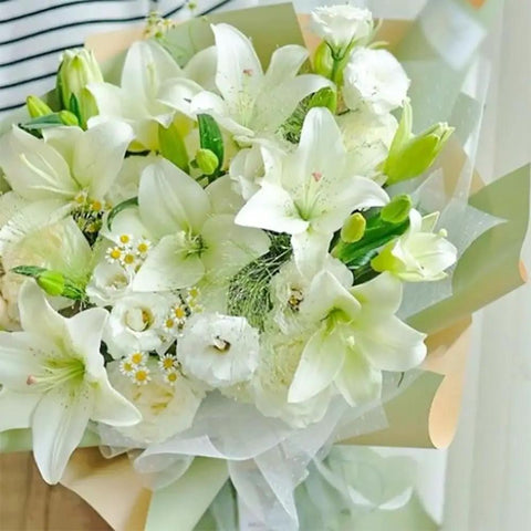 White flowers wrapped in 20 Sheets Flower Wrapping Paper Pack With 22 Inch Double Color Floral Bouquet Paper for gifts and DIY.