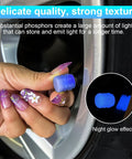 Person holding glow in the dark tire valve cap, showing fluorescent blue glow and easy snap on install for universal fit vehicles.