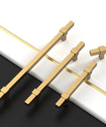 10 Pack 5 Inch Champagne Bronze Cabinet Pulls for Kitchen Cabinets and Drawers, 128mm handles placed diagonally on black and white surface