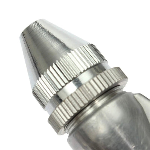 Close-up of 0.5mm nozzle for Top Tier Gravity Feed Pneumatic Spray Gun With 0.5mm Nozzle For Flawless Auto Paint Jobs Built Tough Alloy Frame And Chrome Caps Delivers A Killer Smooth Finish Every Time.