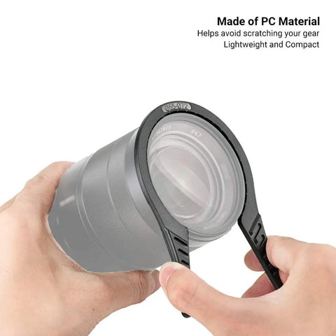 Close-up of hands using Three Pack Camera Lens Filter Wrench Kit With Easy Grip For Fast No Fuss Removal Of Jammed UV CPL ND Filters.
