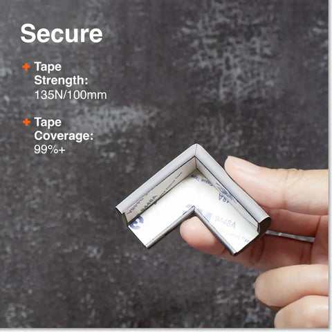 Slimfit Baby Proof Edge Protectors And Corner Guards Hit Different For Nursery Safety Using Soft Nbr Rubber Foam Self Adhesive Strips That Lock In Tight measuring corner protector in a hand