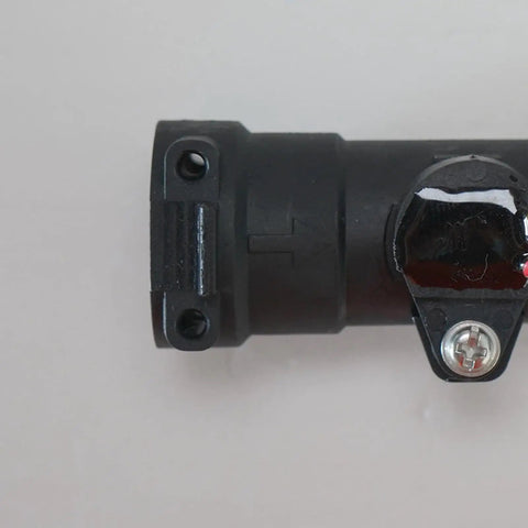 Dope Residential Water Flow Sensor For Home Use With High Sensitivity And Rugged Build That Detects Tiny Flow Changes To Stop Unstable Heating Cycles Save Water And Keep Your Plumbing Running Smooth., black plastic residential water flow sensor side view with mounting screw
