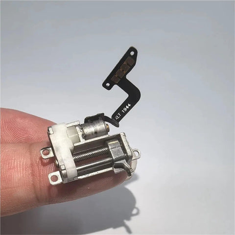 Beefed Up Mini Stepper Motor With Full Metal Planetary Gearbox And Dead Nuts Accurate Ball Bearing Linear Actuator Featuring 10mm Stroke shown in hand.
