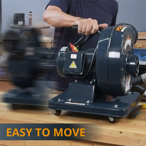 1 HP Portable Dust Collector With 560 CFM For Woodworking, person moving compact system on casters in workshop