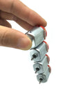 Hand holding stack of four silver metal shell 10 Pack Micro 130 DC Brushed Motors 3V To 12V, High Speed 9,000 To 25,000 RPM No Load
