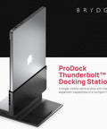 Dead Simple Vertical Thunderbolt 4 MacBook Docking Station Driving Two 4K Displays At 60Hz With Twelve Rock Solid Ports And Hella Fast 96 Watt Charging Plus Magsafe, viewed from side, showing laptop in vertical position.