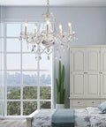 Five Light Modern Crystal Chandelier With K9 Glass Pendants in bedroom, elegant contemporary ceiling fixture over bed, large window view