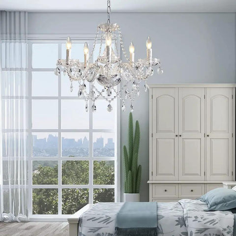 Five Light Modern Crystal Chandelier With K9 Glass Pendants in bedroom, elegant contemporary ceiling fixture over bed, large window view