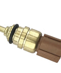 Coolant temperature sensor with brass body and brown connector; close-up view