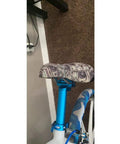 Bicycle with Adjustable 400Mm Bicycle Seat Post With Tilt Head And Easy Install Clamp, aluminum alloy frame and dollar-pattern seat cover.