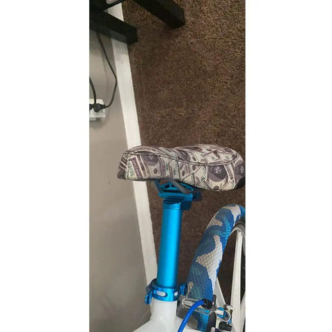 Bicycle with Adjustable 400Mm Bicycle Seat Post With Tilt Head And Easy Install Clamp, aluminum alloy frame and dollar-pattern seat cover.