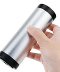 Hand holding Easy To Use Sound Level Calibrator For Decibel Meters And Microphones With 94dB And 114dB Output Levels For One Inch And One Half Inch Mics Fast Calibration For Accurate Readings And Reliable Sonometer Calibration, silver cylindrical device with black ends