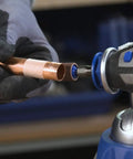 Person using EZ SpeedClic Sanding Bands And Mandrel Set With Two 13 Mm Sanding Bands Grit 60 And 120 Plus One EZ SpeedClic Mandrel on pipe