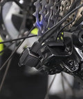 USB C Charging Adapter For Di2 Electronic Derailleurs attached to 12-speed shifting system on a bike, detail view.