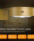 Wireless battery operated picture light in gold finish showing remote sensor, ideal for art frames with smooth dimming.