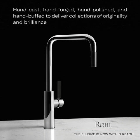 Modern stainless steel kitchen faucet with sleek design against black background.