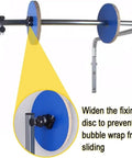 Detail of Built Tough Wall Mounted Bubble Wrap Dispenser showing the fixing disc mechanism for secure bubble wrap support.