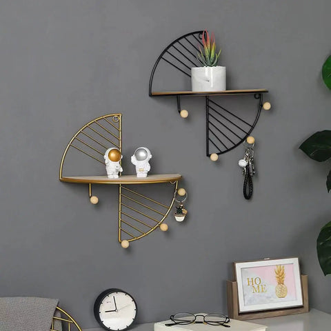 Built Tough Cast Iron Wall Hooks With Wood Floating Shelf And Heavy Duty Coat Rack For Jackets Caps Keys Easy Install Storage Solution For Living Room Decorative Entryway Hanger Frame Modern Vibe on wall with decor items.