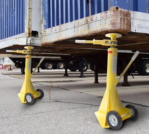 Two Tough As Nails 2 Pack Semi Trailer Stabilizing Jacks in yellow under a trailer, designed for heavy-duty load support.