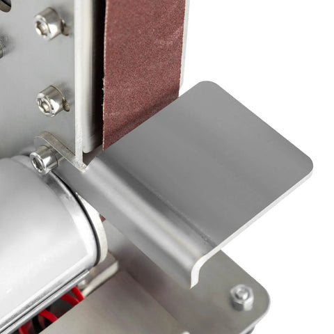 Close-up of the adjustable angle plate on the Real Deal Mini Belt Sander And Bench Grinder With Seven Adjustable Speeds.