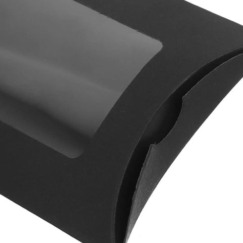 Close-up of 50 Pack Black Kraft Paper Pillow Gift Boxes With Window for Birthday Parties and Events, sleek corner detail.