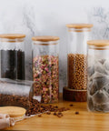 Solid Glass Coffee Containers With Shelf And Hella Secure Lids, Versatile Kitchen Food Storage Jars For Beans Sugar And Tea, 2 Pack with various contents.