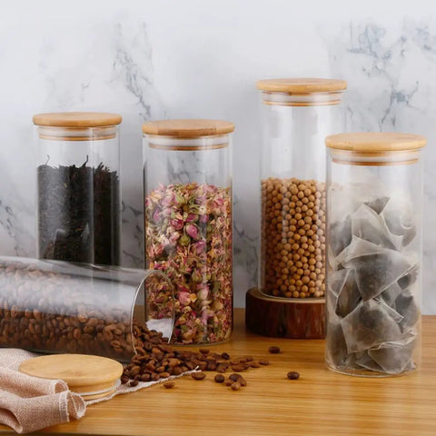 Solid Glass Coffee Containers With Shelf And Hella Secure Lids, Versatile Kitchen Food Storage Jars For Beans Sugar And Tea, 2 Pack with various contents.