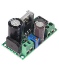 Close-up of a Four Pack AC DC Buck Converter Modules 5 To 30V AC Or 5 To 50V DC In Adjustable Output 3.3 To 33V 2A Voltage Regulator