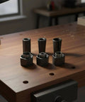 Badass Socket Wrench Assembly Collet Set With Matched Hex Nut Pairs on wooden workbench for precision metalworking tasks.