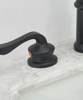 Close-up of left lever handle on Black Waterfall Bathroom Faucet With 8 Inch Widespread Arc, Dual Lever Handles.
